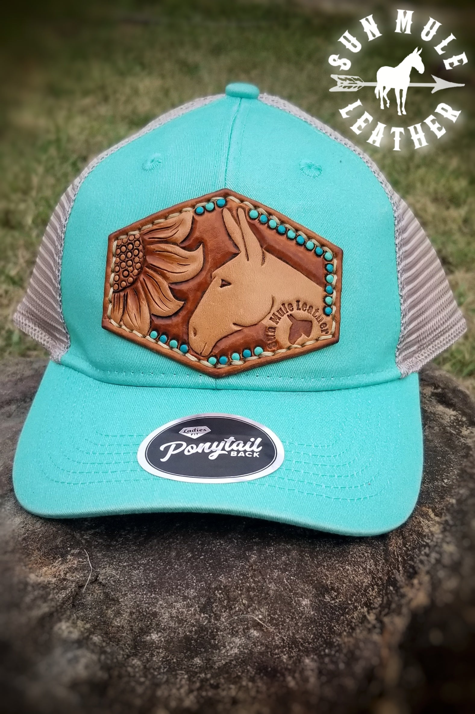 Sun Mule Leather handtooled mule hat patch, handsewn to ponytail mint colored structured hat.