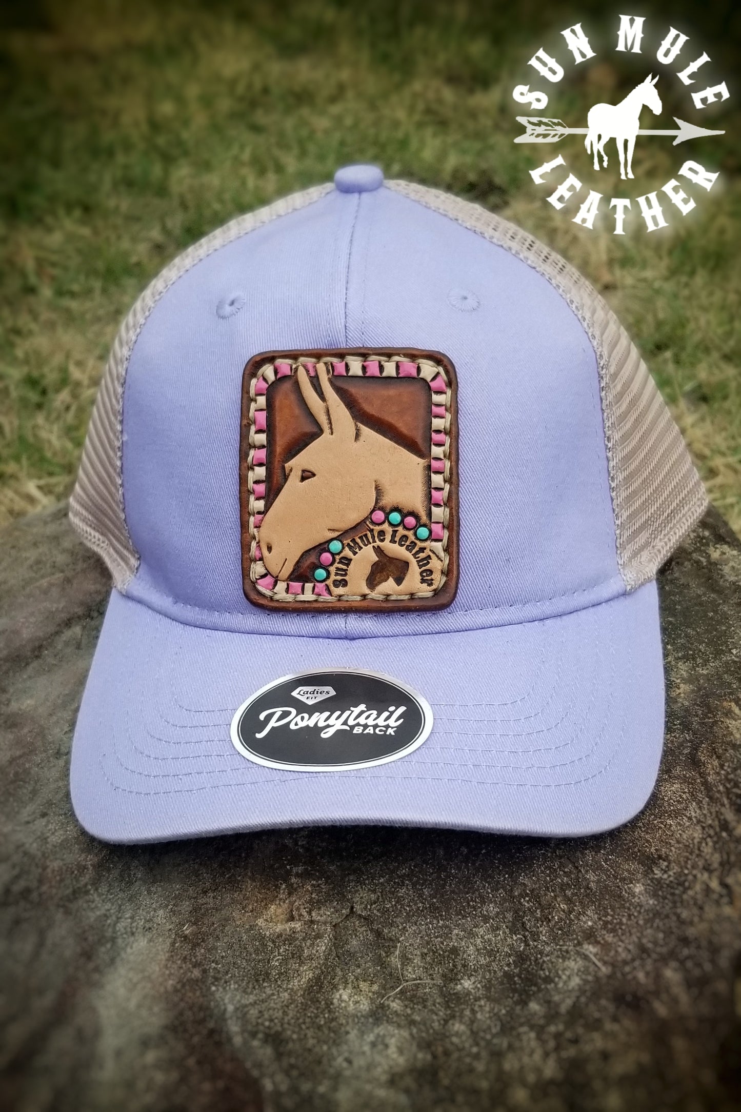 Sun Mule Leather Lavender handtooled mule hat patch, handsewn to ponytail hat.