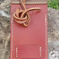 back view of Phone holder pouch for saddle or belt with hand tooled sunflower